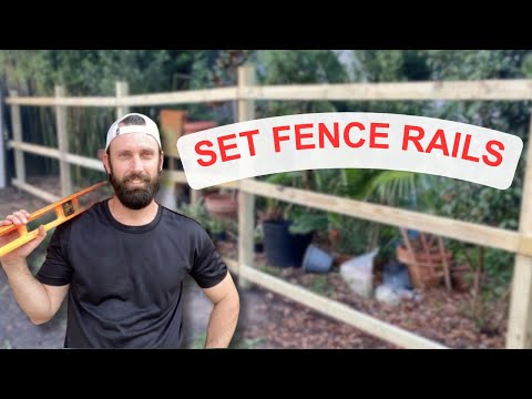 How to Set Fence Rails | Pt. 2 of 3 - Building a Privacy Fence | Set Railing on Wooden Fence Posts