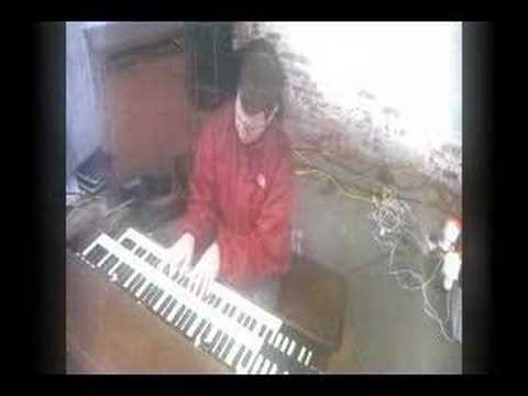 Sam Gilman Playing a Requiem to the Otis Grove Raid Show