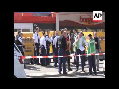 Church services were held Sunday in a quiet suburb outside Amsterdam to mourn six people killed by a