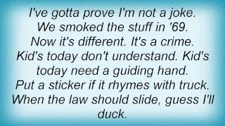 Bruce Dickinson - Lickin' The Gun Lyrics