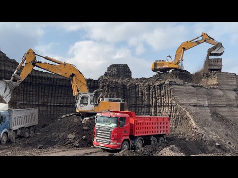 Two Liebherr 974 Excavators Loading Trucks