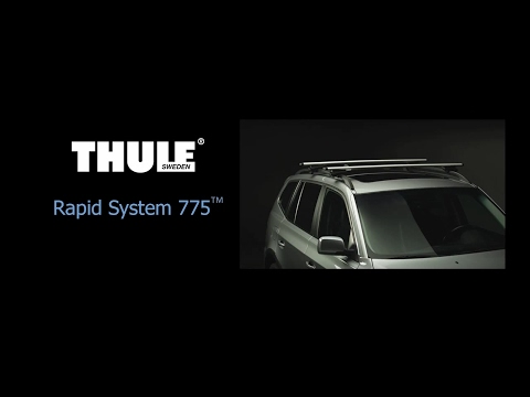 Багажник на крышу Thule Rapid System 775 аэродинамические дуги, крепление на рейлинги  Установка