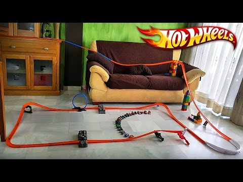 HOT WHEELS IN THE LIVING ROOM!! Race Track Builder HotWheels Toy Cars in the Living Room