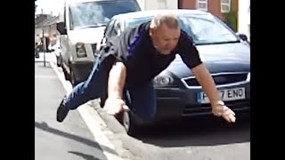 A  clown takes a pratfall