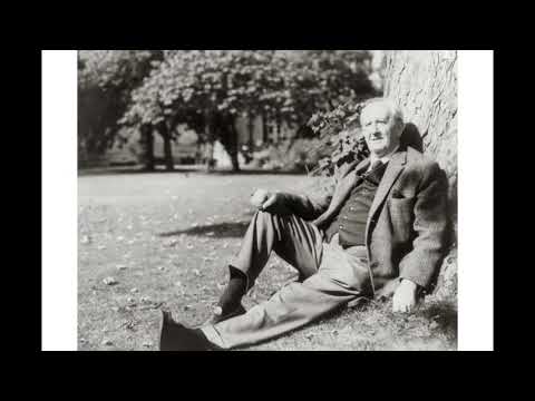 J.R.R. Tolkien,John Ronald Reuel Tolkien,1892-1973,leaning against tree,author
