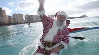 Santa takes Hawaii beach break ahead of his big day - no comment