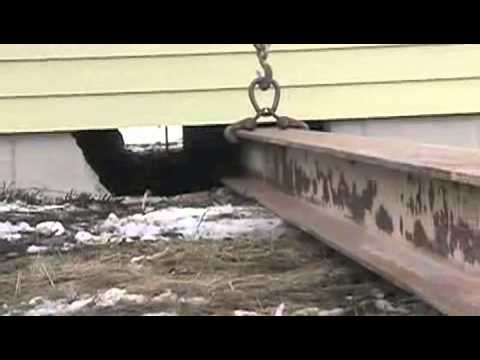 Part of a video titled Demonstration of Moving a Home - Part 1 - YouTube