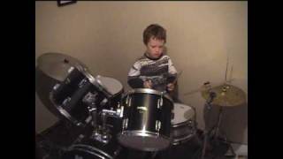 kiwi kid Sam aged 8 playing drums