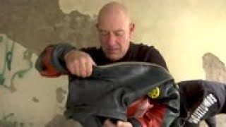 From straw hats to scuba helmets, gondoliers clean canals