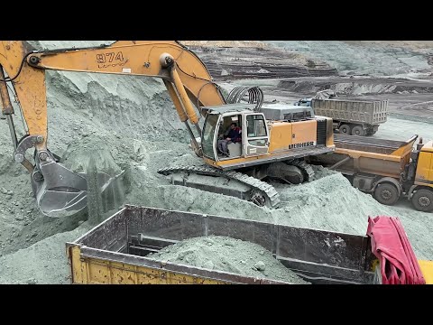 Liebherr 974 Excavator Loading Mercedes And MAN Trucks With Three Passes