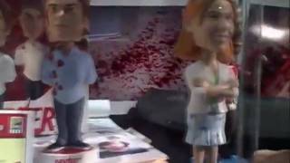 A flyby of the Dexter bobble heads and other props. Notice the person in the background say that's gross.