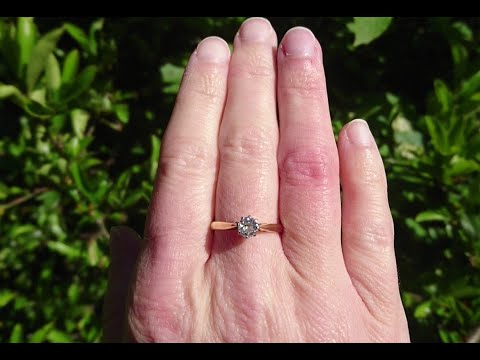 A 18ct gold half carat diamond solitaire engagement ring