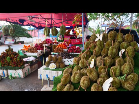 The King of Fruit! Many Durains and Oranges, rambutans,apples and more are selling on the sidewalk