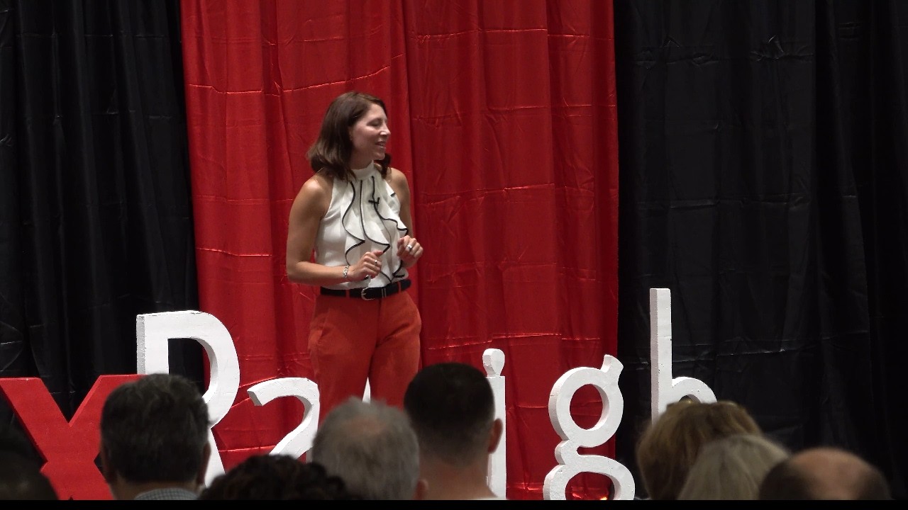 Gina Casazza speaking during her TEDx Talk How Curiosity Fuels Resilience