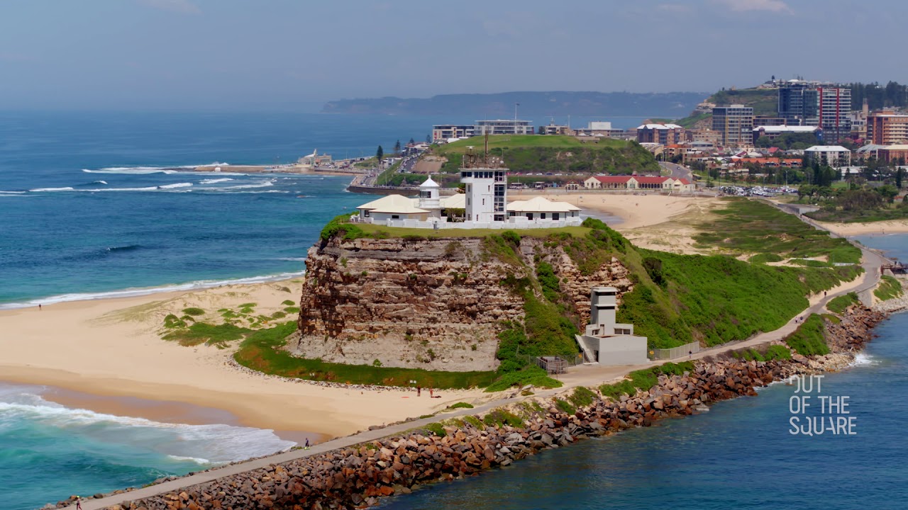 Experience the aerial panoramas of Nobbys Headland & Breakwall.
