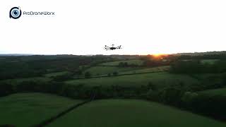 Drone technology used to pull rope between power transmission and distribution pylons