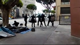 SHOCK VIDEO: LAPD Kill Black Man Lying on Ground After Tasering Him