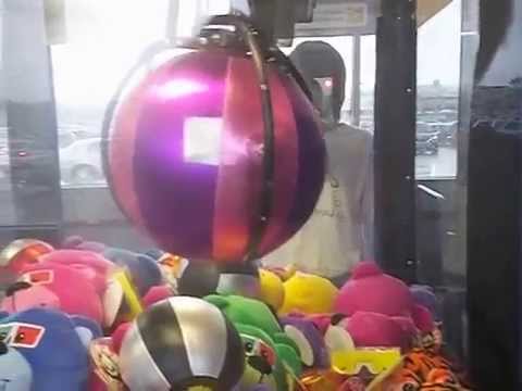 PINNACLE CLAW MACHINE@WALMART A PINK MAN BALL AS REQUESTED