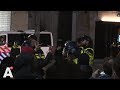 ME komt in actie op Dam