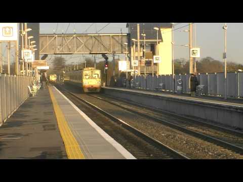 Irish Rail 8100 EMU 8120 + 81xx + 8125 departs and 8520 EMU 8535 + 8537 arrives at Clontarf Road