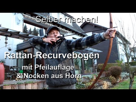 Homemade rattan bow with nocks and horn arrow rest