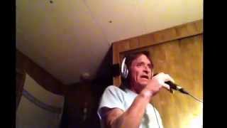 Michael singing we hold our hearts out to you, ( Petra)