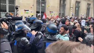 Riot police arrive to separate pro-Palestinian and pro-Israeli demonstrators in Paris