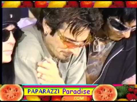 MOTLEY CRUE unites to place hands in cement  -- 1997