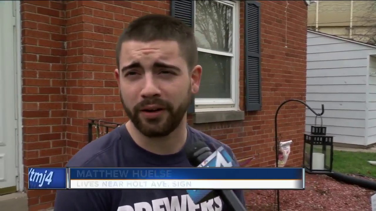 Strange stickers found on Milwaukee exit signs