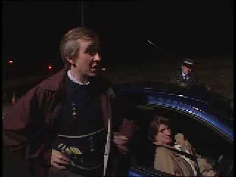 Alan Partridge steals a traffic cone.