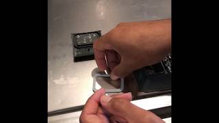 How to remove and clean Frigidaire dishwasher cap from the soap dispenser.