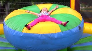 Outdoor Playground for children - we ride a roller coaster and jump on a trampoline