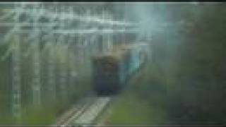 preview picture of video 'Wood freight train 4430 passes Lahnakangas level crossing'