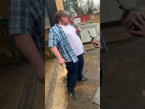 Fat guy smokes 10 cigarettes for views.
