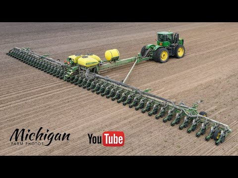 , title : 'Huge John Deere DB120 48 row 30" 120' wide corn planter in action in Michigan!'