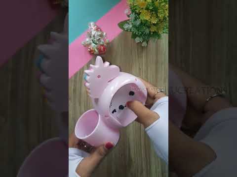 Round unicorn alarm clock with pen holder, size: 14 x 6 x 12...