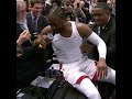 DWYANE WADE TRIPS TRYING TO JUMP ON THE SCORING TABLE