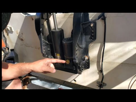 Outboard boat motor tilt & trim problems fixed by filling with fluid and bleeding the system