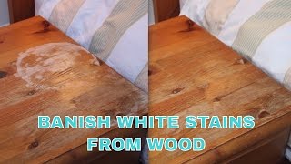 Iron out white water stains from wooden furniture