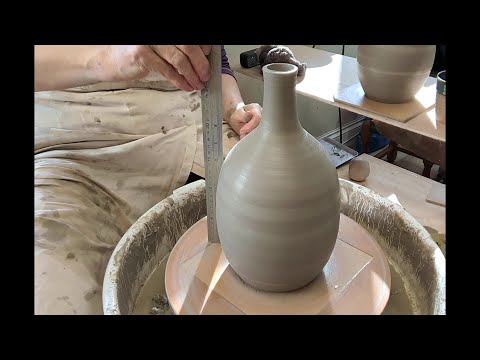 Throw a long necked bottle - timelapse