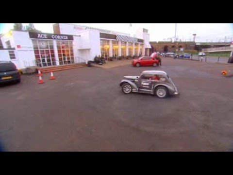 Terry Grant Changing Wheel On Donut Car