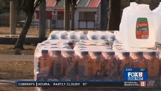 Kenner distributes free bottles of water to residents during freeze