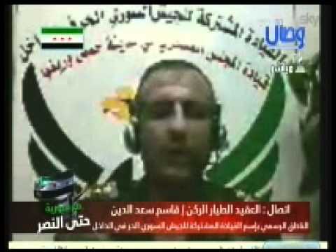 مقابلة تلفزيونية مع العقيد الطيار الركن قاسم سعد الدين للحديث عن الأساليب التي تستخدمها قوات النظام في المعارك العسكرية