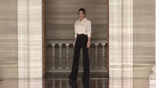 Models and designer on the runway for the Victoria Beckham Fashion Show in London