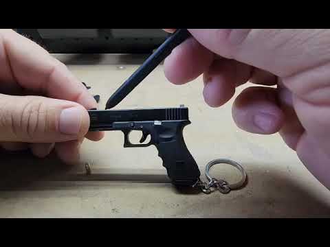 The Ultimate Guy keychain Product Review of metal Glock 17 #Fidget #JustAToy #RelentlessArms