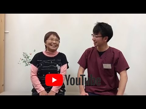 女性の患者さんと院長が会話をしている画像