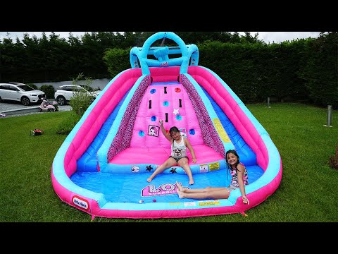 Masal and Öykü Pretend Play with Water Slide Inflatable Toys