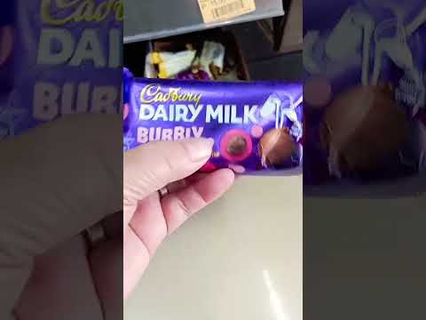 CADBURY DAIRY MILK #asmr #satisfyingtastesound #chocolate filled with coated peanut #trending #short
