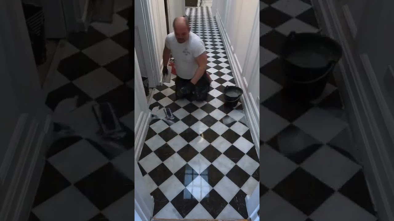 Watch video Marble checkerboard hallway floor grouting action 🔥 #marble #hallway #grouting #shorts Now Marble checkerboard hallway floor grouting action 🔥 #marble #hallway #grouting #shorts