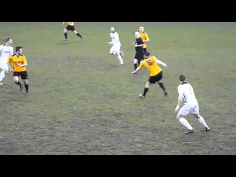 ALVECHURCH'S EVANS PUNCHES AWAY AN EARLY HEREFORD CROSS